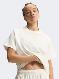 تيشيرت رياضي نسائي من Adidas بلون أبيض مائل للصفرة