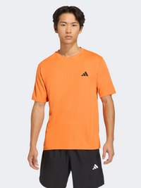 أديداس أساسيات التمرين للرجال قميص تدريب برتقالي نقي
