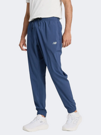 New Balance Essentials Woven Jogger بنطال أداء رجالي كحلي