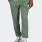 New Balance Essentials Stacked Logo French Terry Men Lifestyle Pant Olive Green