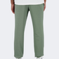 New Balance Essentials Stacked Logo French Terry Men Lifestyle Pant Olive Green